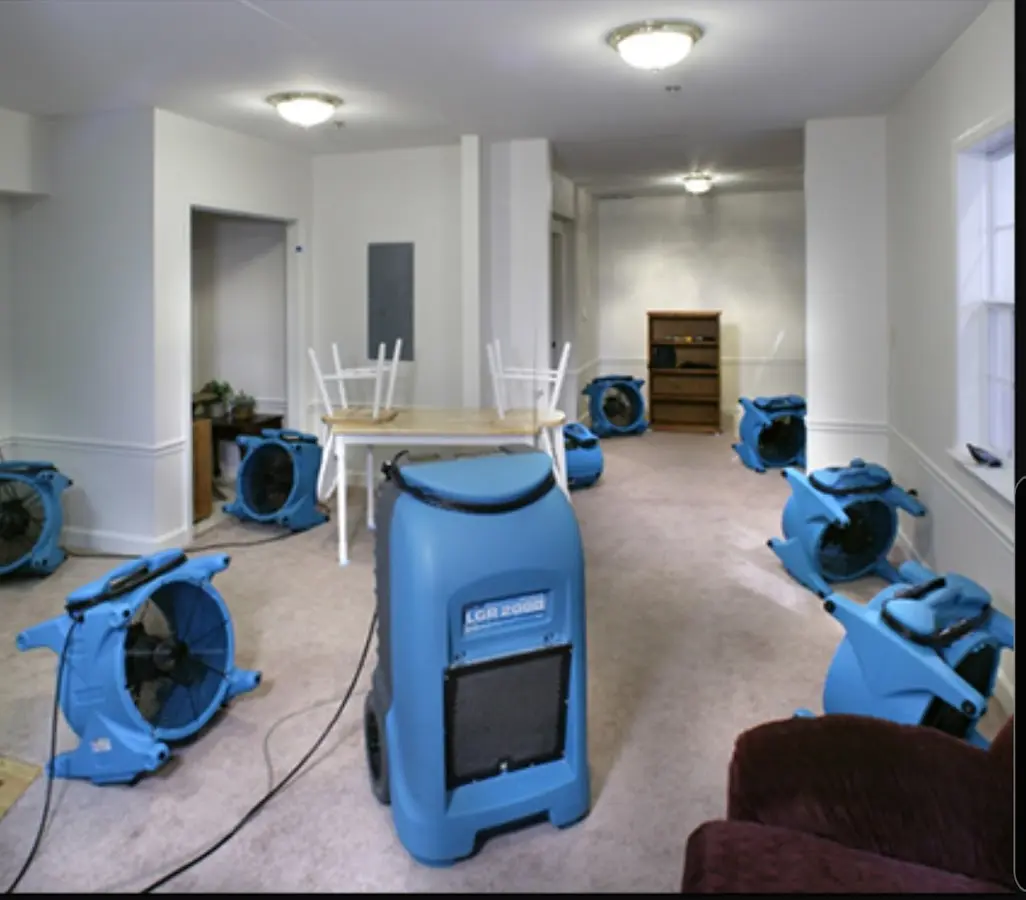 Air movers and dehumidifier setup for Water Damage Restoration in Gallatin